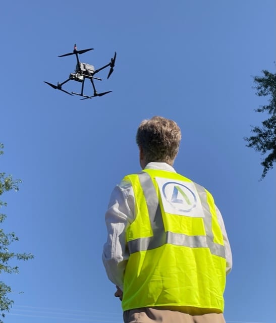 drone operator flying drone